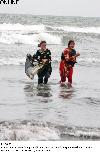 Previous picture :: Girls enjoy walk in water at seaside during hot weather in the city on Wednesday.